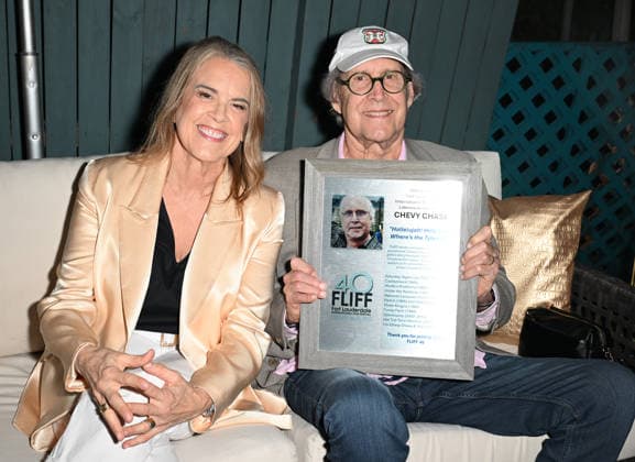 FORT LAUDERDALE FL - FEBRUARY 26: Chevy Chase with Marina Zenovich at the I m Chevy Chase and You re Not Premiere during The 40th annual Fort Lauderdale International Film Festival at Savor Cinema on February 26, 2026 in Fort Lauderdale, Florida. Copyright: xmpi04x