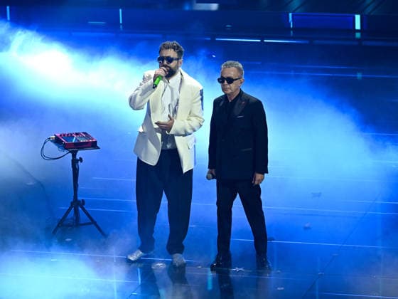 Sanremo, 76th Italian Song Festival. Fourth Evening. Pictured: Dargen D Amico with Pupo and Fabrizio Bosso.  Copyright: xMaurizioxD Avanzox xipa-agency.netx xPoolxSanremox02x IPA_Agency_IPA72121797