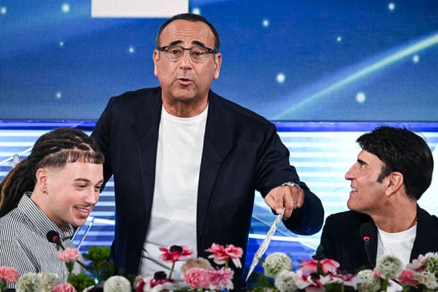 March 1, 2026, Sanremo, Italy: Sanremo Festival host and artistic director Carlo Conti (C) with Italian singers Sayf (L) and Sal Da Vinci (R) during a press conference at the 76th edition of the Sanremo Italian Song Festival, in Sanremo, Italy, 1st March 2026. The music festival will run from 24 to 28 February 2026. ANSA RICCARDO ANTIMIANI. Sanremo Italy  - ZUMAa110 20260301_zaf_a110_096 Copyright: xRiccardoxAntimianix