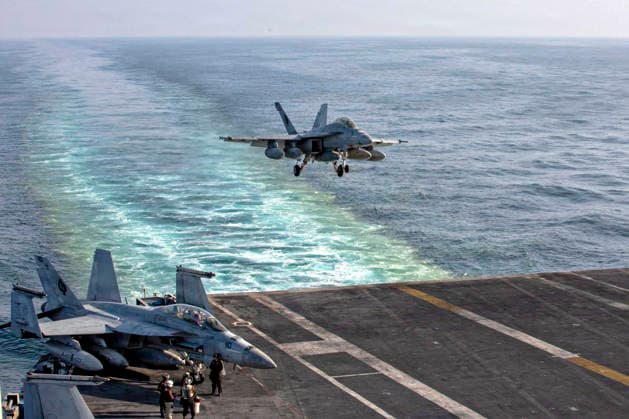 March 1, 2026, Undisclosed Location, United States: A U.S. Navy F A-18F Super Hornet, with the Black Aces of Strike Fighter Squadron 41, lands on the flight deck of the Nimitz-class aircraft carrier USS Abraham Lincoln during Operation Epic Fury, February 28, 2026, from an undisclosed location. The United States and Israel launched joint strikes on Iran. Undisclosed Location United States - ZUMAp138 20260301_zaa_p138_015 Copyright: xMsgt.xKulanixLakanaria U.S.xNavyx
