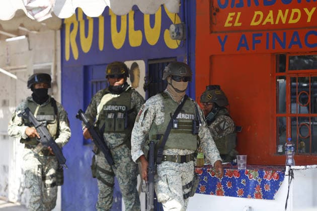 Funeral preparations are underway, believed to be for the slain cartel leader El Mencho in Guadalajara GUADALAJARA, MEXICO - MARCH 1: Mexican Army members take security measures near the La Paz funeral home, where the body of Nemesio Oseguera Cervantes, the leader of the Jalisco New Generation Cartel (CJNG) known as El Mencho , is believed to be located in Guadalajara, Jalisco, Mexico, on March 1, 2026. Stringer Anadolu Guadalajara Mexico. Editorial use only. Please get in touch for any other usage.  Copyright: x2026xAnadoluxStringerx
