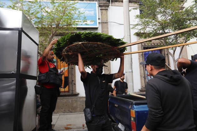 Funeral preparations are underway, believed to be for the slain cartel leader El Mencho in Guadalajara GUADALAJARA, MEXICO - MARCH 1: Employees unload a floral arrangement outside the La Paz funeral home as Mexican Army members take security measures near the funeral home, where the body of Nemesio Oseguera Cervantes, the leader of the Jalisco New Generation Cartel (CJNG) known as El Mencho , is believed to be located in Guadalajara, Jalisco, Mexico, on March 1, 2026. Stringer Anadolu Guadalajara Mexico. Editorial use only. Please get in touch for any other usage.  Copyright: x2026xAnadoluxStringerx