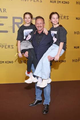 01 03 2026, Markus Ertelt with daughters Mina and Elena at the exclusive special screening of the fast-paced animated adventure Hoppers, Zoopalast, Berlin, Berlin Germany, Germany