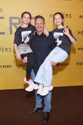01 03 2026, Markus Ertelt with daughters Mina and Elena at the exclusive special screening of the fast-paced animated adventure Hoppers, Zoopalast, Berlin, Berlin Germany, Germany