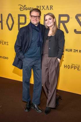 abb Max Giermann and Martina Hill on the black carpet at the special screening of Hoppers at Zoo Palast Berlin Sunday 01 03 2026 in Berlin Berlin Germany