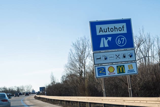 Autohof at a federal highway Autobahn, Germany, 15 02 2026 Traffic signs inform about a rest and service area at a federal highway Symbolic image for traffic infrastructure and rest areas in Germany
