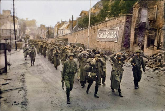 U.S. Troops Marching German Prisoners in Street, Battle of Cherbourg, Cherbourg, France, June 1944  Copyright: xABxArchivex jtv011718