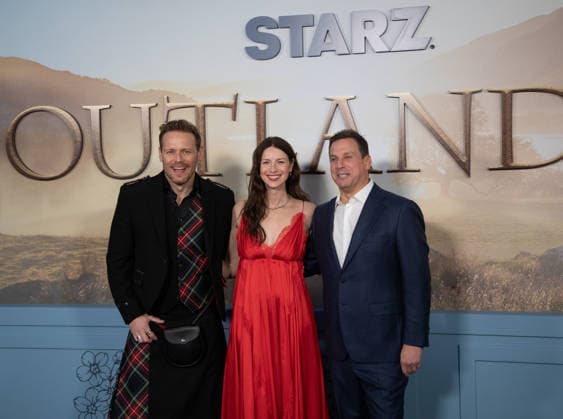 Sam Heughan, Caitriona Balfe and Jeffrey A. Hirsch arrive on the red carpet at the premiere of Starz Outlander Season 8 at Alice Tully Hall on March 2, 2026 in New York City.  NYP20260302514 SERENAxXUxNING