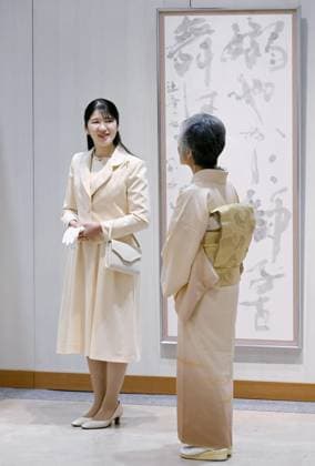 Princess Aiko at calligraphy exhibition Japanese Princess Aiko (L) visits an exhibition of works by female calligraphers at a Tokyo department store on March 2, 2026. (Pool photo)  A14AA0005343847P