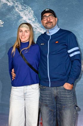 Tobi Baumann with companion at the world premiere of the documentary On The Wave at Cinedom Cologne, 02 03 2026 Foto:xT.xNgox xFuturexImagex wave_6301