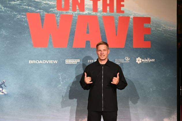 Surfer Sebastian Steudtner attends the premiere of the film On the Wave at Colognes Cinedom