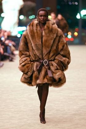 (260304) -- PARIS, March 4, 2026 -- A model presents a creation from the ready-to-wear Fall Winter 2026-2027 collections by Saint Laurent during the Paris Fashion Week in Paris, France, on March 3, 2026. (MeetEurope Handout via Xinhua) FRANCE-PARIS-FASHION WEEK-SAINT LAURENT WuxHuiwo 
