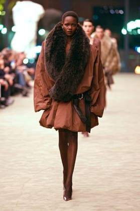 (260304) -- PARIS, March 4, 2026 -- A model presents a creation from the ready-to-wear Fall Winter 2026-2027 collections by Saint Laurent during the Paris Fashion Week in Paris, France, on March 3, 2026. (MeetEurope Handout via Xinhua) FRANCE-PARIS-FASHION WEEK-SAINT LAURENT WuxHuiwo 