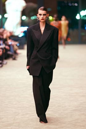 (260304) -- PARIS, March 4, 2026 -- A model presents a creation from the ready-to-wear Fall Winter 2026-2027 collections by Saint Laurent during the Paris Fashion Week in Paris, France, on March 3, 2026. (MeetEurope Handout via Xinhua) FRANCE-PARIS-FASHION WEEK-SAINT LAURENT WuxHuiwo 