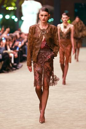(260304) -- PARIS, March 4, 2026 -- A model presents a creation from the ready-to-wear Fall Winter 2026-2027 collections by Saint Laurent during the Paris Fashion Week in Paris, France, on March 3, 2026. (MeetEurope Handout via Xinhua) FRANCE-PARIS-FASHION WEEK-SAINT LAURENT WuxHuiwo 