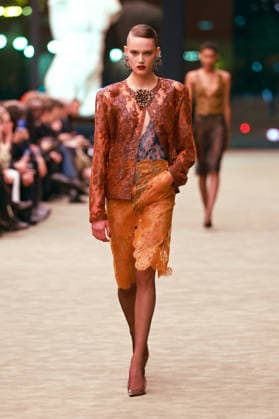 (260304) -- PARIS, March 4, 2026 -- A model presents a creation from the ready-to-wear Fall Winter 2026-2027 collections by Saint Laurent during the Paris Fashion Week in Paris, France, on March 3, 2026. (MeetEurope Handout via Xinhua) FRANCE-PARIS-FASHION WEEK-SAINT LAURENT WuxHuiwo 