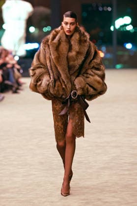 (260304) -- PARIS, March 4, 2026 -- A model presents a creation from the ready-to-wear Fall Winter 2026-2027 collections by Saint Laurent during the Paris Fashion Week in Paris, France, on March 3, 2026. (MeetEurope Handout via Xinhua) FRANCE-PARIS-FASHION WEEK-SAINT LAURENT WuxHuiwo 