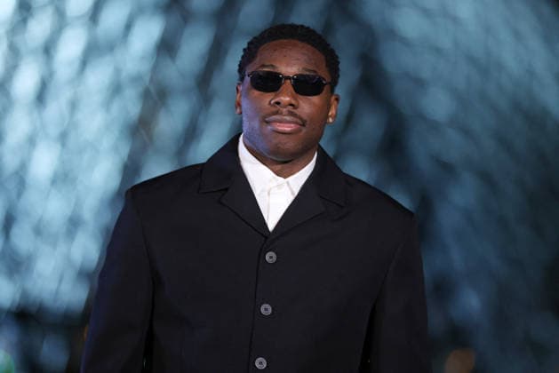 PFW Le Grand Diner du Louvre Arrivals Photocall Tiakola attending the Le Grand Diner du Louvre Arrivals Photocall at the Musee du Louvre as part of Paris Fashion Week on March 03, 2026 in Paris, France. Photo by Jerome Dominé ABACAPRESS.COM Paris France  Copyright: xDominexJerome ABACAx