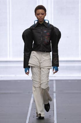 PFW - Anrealage Fecales Runway A model walks the runway during the Anrealage Womenswear Fall Winter 2026-2027 show as part of Paris Fashion Week on March 03, 2026 in Paris, France. Photo by Alain Gil Gonzalez ABACAPRESS.COM Paris France  Copyright: xGonzalezxAlain-Gil ABACAx
