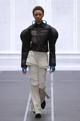 PFW - Anrealage Fecales Runway A model walks the runway during the Anrealage Womenswear Fall Winter 2026-2027 show as part of Paris Fashion Week on March 03, 2026 in Paris, France. Photo by Alain Gil Gonzalez ABACAPRESS.COM Paris France  Copyright: xGonzalezxAlain-Gil ABACAx