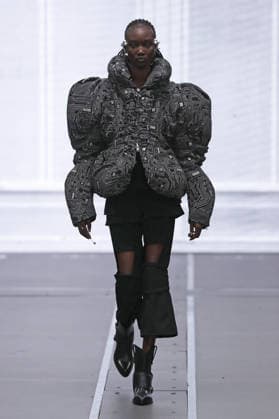 PFW - Anrealage Fecales Runway A model walks the runway during the Anrealage Womenswear Fall Winter 2026-2027 show as part of Paris Fashion Week on March 03, 2026 in Paris, France. Photo by Alain Gil Gonzalez ABACAPRESS.COM Paris France  Copyright: xGonzalezxAlain-Gil ABACAx