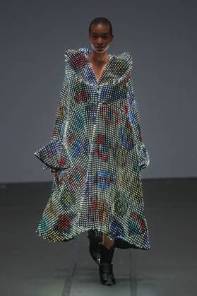 PFW - Anrealage Fecales Runway A model walks the runway during the Anrealage Womenswear Fall Winter 2026-2027 show as part of Paris Fashion Week on March 03, 2026 in Paris, France. Photo by Alain Gil Gonzalez ABACAPRESS.COM Paris France  Copyright: xGonzalezxAlain-Gil ABACAx
