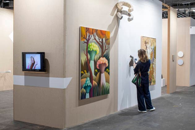 March 4, 2026, Madrid, Madrid, Spain: A woman takes a photograph of a work of art with her cell phone during the opening of ARCO (Spain s International Contemporary Art Fair) at its 45th edition at the IFEMA exhibition center in Madrid. Madrid Spain - ZUMAs296 20260304_znp_s296_005 Copyright: xLuisxSotox