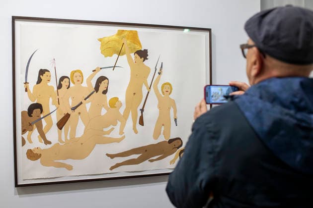 March 4, 2026, Madrid, Madrid, Spain: A visitor photographs Kubra Khademi s artwork depicting powerful women from around the world during the opening of ARCO (Spain s International Contemporary Art Fair) at its 45th edition at the IFEMA exhibition center in Madrid. Madrid Spain  - ZUMAs296 20260304_znp_s296_014 Copyright: xLuisxSotox