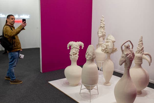 March 4, 2026, Madrid, Madrid, Spain: A visitor photographs a work of art with her cell phone during the opening of ARCO (Spain s International Contemporary Art Fair) at its 45th edition at the IFEMA exhibition center in Madrid. Madrid Spain  - ZUMAs296 20260304_znp_s296_015 Copyright: xLuisxSotox