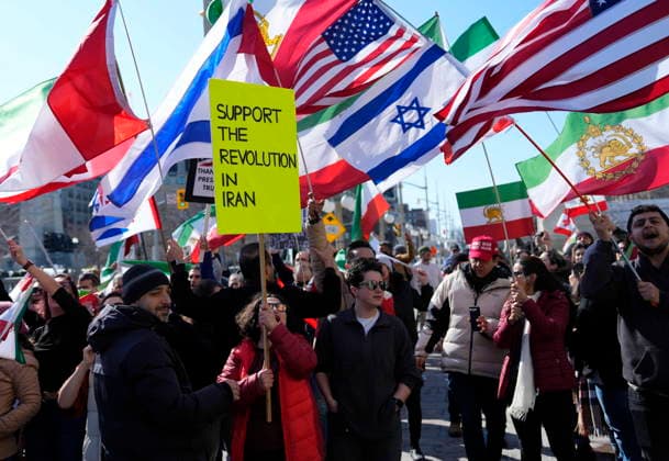 March 4, 2026, Ottawa, On, CAN: People, including members of the Iranian-Canadian community, rally in support of the United States and Israel s military strikes in Iran, outside the Ottawa Conference on Defence and Security in Ottawa, on Wednesday, March 4, 2026. Ottawa CAN - ZUMAc35_ 20260304_zaf_c35_085 Copyright: xJustinxTangx