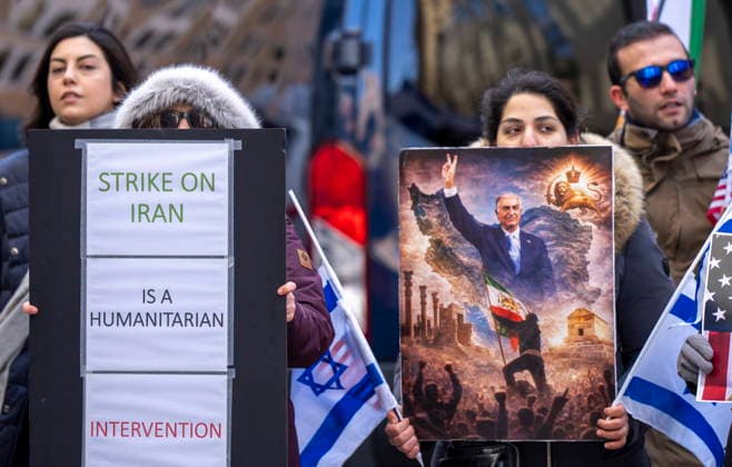 March 4, 2026, Montreal, Pq, CANADA: Demonstrators show support for military intervention in Iran by the United States and Israel during a rally in front of the U.S. Consulate in Montreal on Wednesday, March 4, 2026. Montreal CANADA  - ZUMAc35_ 20260304_zaf_c35_091 Copyright: xChristinnexMuschix