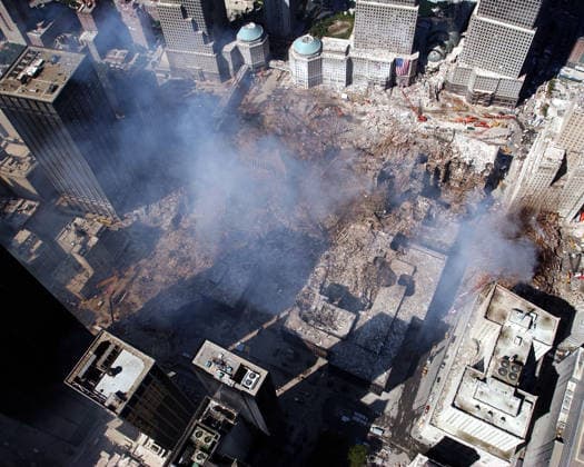 Operation Noble Eagle Sep. 17, 2001 - New York, New York, U.S. - An aerial view shows only a small portion of the crime scene where the World Trade Center collapsed following the Sept. 11 terrorist attack. Surrounding buildings were heavily damaged by the debris and massive force of the falling twin towers. Clean-up efforts continued for months. On the morning of September 11, 2001, nineteen al-Qaeda terrorists hijacked four commercial passenger jet airliners. The hijackers intentionally crashed two of the airliners into the Twin Towers of the World Trade Center in New York City, the 1st at 8:46 a.m., American Airlines Flight 11 was crashed into the World Trade Center s North Tower, followed by United Airlines Flight 175, which hit the So Copyright: xEricxJ.xTilfordx