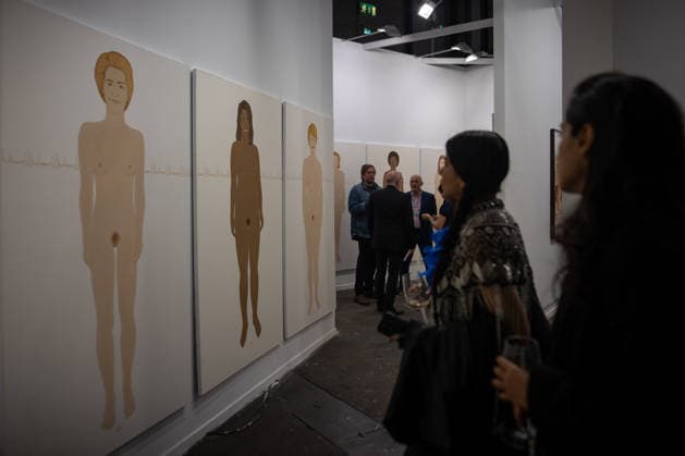 Opening of ARCO (Spain s International Contemporary Art Fair) in Madrid, Spain - 04 Mar 2026 A visitor seen observing the work of Kubra Khademi, which portrays powerful women from around the world during the opening of ARCO (Spain s International Contemporary Art Fair) at its 45th edition at the IFEMA exhibition center. Madrid Spain Copyright: xDavidxCanalesx xSOPAxImagesx DCARCO260304-9