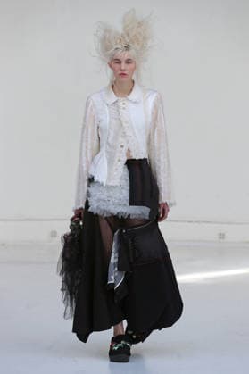 PFW - Reverie by Caroline Hu Runway A model walks the runway during the Reverie by Caroline Hu Womenswear Fall Winter 2026-2027 show as part of Paris Fashion Week on March 04, 2026 in Paris, France. Photo by Alain Gil Gonzalez ABACAPRESS.COM Paris France  Copyright: xGonzalezxAlain-Gil ABACAx