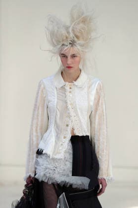 PFW - Reverie by Caroline Hu Runway A model walks the runway during the Reverie by Caroline Hu Womenswear Fall Winter 2026-2027 show as part of Paris Fashion Week on March 04, 2026 in Paris, France. Photo by Alain Gil Gonzalez ABACAPRESS.COM Paris France  Copyright: xGonzalezxAlain-Gil ABACAx