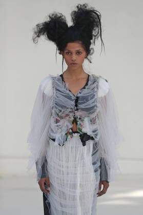 PFW - Reverie by Caroline Hu Runway A model walks the runway during the Reverie by Caroline Hu Womenswear Fall Winter 2026-2027 show as part of Paris Fashion Week on March 04, 2026 in Paris, France. Photo by Alain Gil Gonzalez ABACAPRESS.COM Paris France  Copyright: xGonzalezxAlain-Gil ABACAx