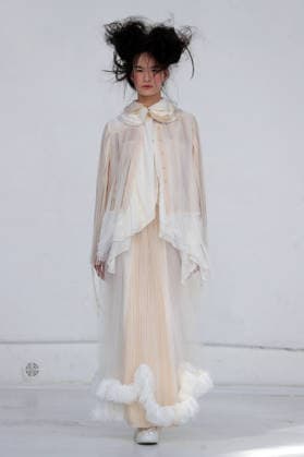 PFW - Reverie by Caroline Hu Runway A model walks the runway during the Reverie by Caroline Hu Womenswear Fall Winter 2026-2027 show as part of Paris Fashion Week on March 04, 2026 in Paris, France. Photo by Alain Gil Gonzalez ABACAPRESS.COM Paris France  Copyright: xGonzalezxAlain-Gil ABACAx