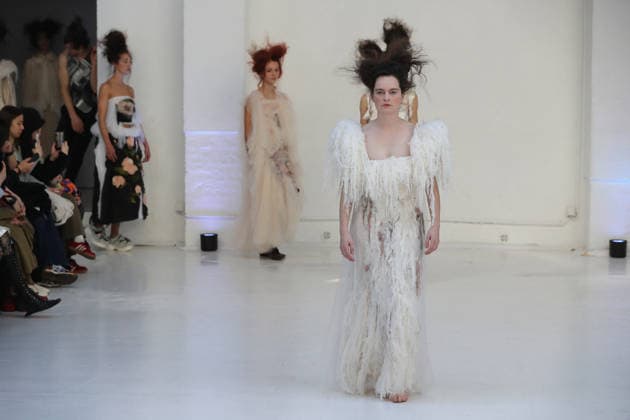 PFW - Reverie by Caroline Hu Runway A model walks the runway during the Reverie by Caroline Hu Womenswear Fall Winter 2026-2027 show as part of Paris Fashion Week on March 04, 2026 in Paris, France. Photo by Alain Gil Gonzalez ABACAPRESS.COM Paris France  Copyright: xGonzalezxAlain-Gil ABACAx
