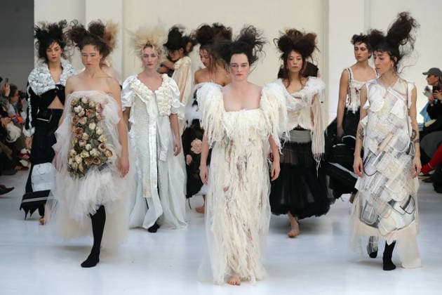PFW - Reverie by Caroline Hu Runway A model walks the runway during the Reverie by Caroline Hu Womenswear Fall Winter 2026-2027 show as part of Paris Fashion Week on March 04, 2026 in Paris, France. Photo by Alain Gil Gonzalez ABACAPRESS.COM Paris France  Copyright: xGonzalezxAlain-Gil ABACAx