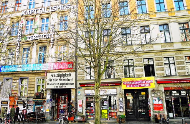 The façade of Kastanienallee 86 in the middle of the trendy Prenzlauer Berg neighborhood Since the fall of the Berlin Wall in 1989, the Kapiatalism lettering has adorned the front of the alternative building Next to it i