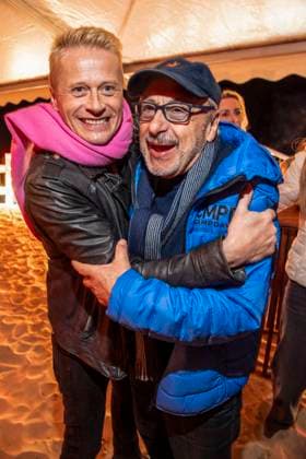 abb Roman Knizka and Wolfgang Stumph as guests on the beach at the 10th anniversary of Baltic Lights 2026 celebrity charity sled dog race in aid of Welthungerhilfe on the Baltic Sea between the Ahlbeck sea bridge and the Heringsdorf sea bridge, Friday 06 03 2026 in Heringsdorf MV Germany