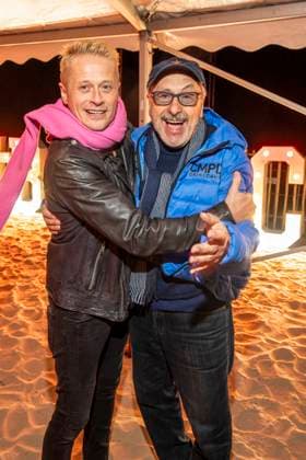 abb Roman Knizka and Wolfgang Stumph as guests on the beach at the 10th anniversary of Baltic Lights 2026 celebrity charity sled dog race in aid of Welthungerhilfe on the Baltic Sea between the Ahlbeck sea bridge and the Heringsdorf sea bridge, Friday 06 03 2026 in Heringsdorf MV Germany