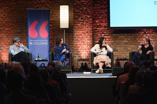 Author and director David Schalko, Eva Menasse, author Vea Kaiser author Verena Rossbacher, l t, on stage speaking and reading about Vienna calling at Lit Cologne, the international literature festival