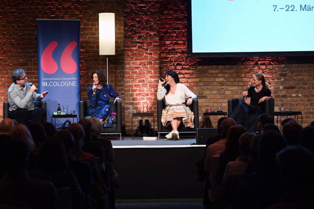 Author and director David Schalko, Eva Menasse, author Vea Kaiser author Verena Rossbacher, l t, on stage speaking and reading about Vienna calling at Lit Cologne, the international literature festival