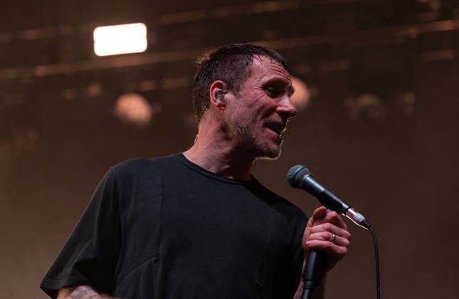 PUNK BAND Sleaford Mods AT BRIXTON ACADEMY LONDON awards 7 03 26 Gwendoline Christie live on stage for one night only along with Sue Tompkins, Orbital and Heartworms PUNK BAND Sleaford Mods AT BRIXTON ACADEMY LONDON awards 7 03 26 Jason Williamson and Andrew Fearn Gwendoline Christie live on stage for one night only along with Sue Tompkins, Orbital and Heartworms Originally started as the solo project of Jason Williamson in 2006, he put out two albums before recruiting Andrew Fern in 2009, becoming the duo we know today. Since then, they have gained a cult following across the UK and beyond, putting out a further 10 albums including, most recently, UK Grim in 2023. Their new album, The Demise Of Planet X™, is set to a Copyright: xRogerxAlarconx xAvalonx 1080976911