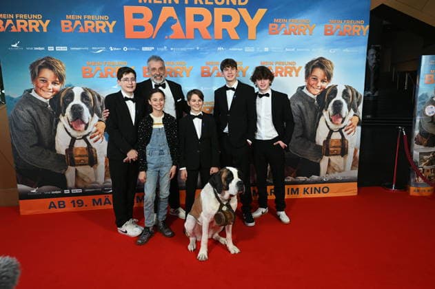 Actors Mael Gallati, Lino Good, Maxim Kämpf, Alma Büchenbacher, Paco von Wyss as Georg, director Markus Welter with St. Bernard Barry come to the film premiere of Mein Freund Barry at the Cinedom in Cologne