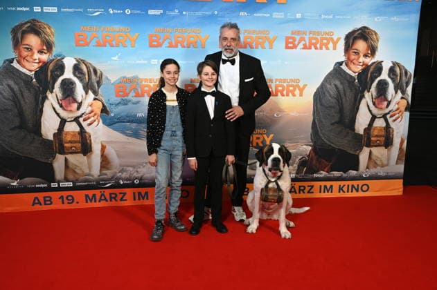 Actors Alma Büchenbacher, Paco von Wyss as Georg, director Markus Welter with St. Bernard Barry come to the film premiere of Mein Freund Barry at the Cinedom in Cologne