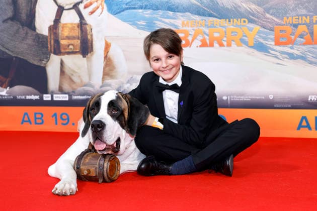 Child actor Paco von Wyss with dog Barry at the premiere of the film Mein Freund Barry , a childrens film about an avalanche dog, at the Cinedom cinema in Cologne, 08 03 2026 NRW Germany Copyright: xChristophxHardtx