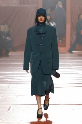 (260309) -- PARIS, March 9, 2026 -- A model presents a creation from the ready-to-wear Fall Winter 2026-2027 collections by Lacoste during the Paris Fashion Week in Paris, France, on March 8, 2026. (MeetEurope Handout via Xinhua) FRANCE-PARIS-FASHION WEEK-LACOSTE WuxHuiwo 
