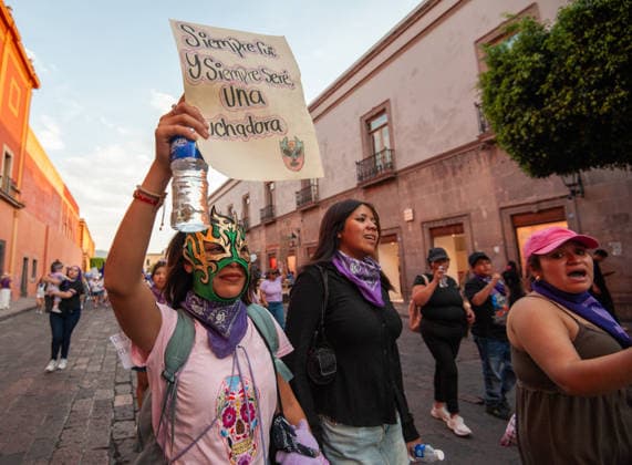 Mexico International Women™s Day A woman lifts a placard while taking part during a demonstration in Queretaro to commemorate the International Women s Day to demand equality gender and women s rights. Thousands of women around the world are joining the global International Women s Day strike. on March 8, 2026 in Queretaro, Mexico. (Photo by Jose Carrera Eyepix Group) Copyright: xJosexCarrera xEyepixxGroupx JFC_08032026_177647